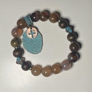 Bracelet- glass and metal beads with leaf and cross